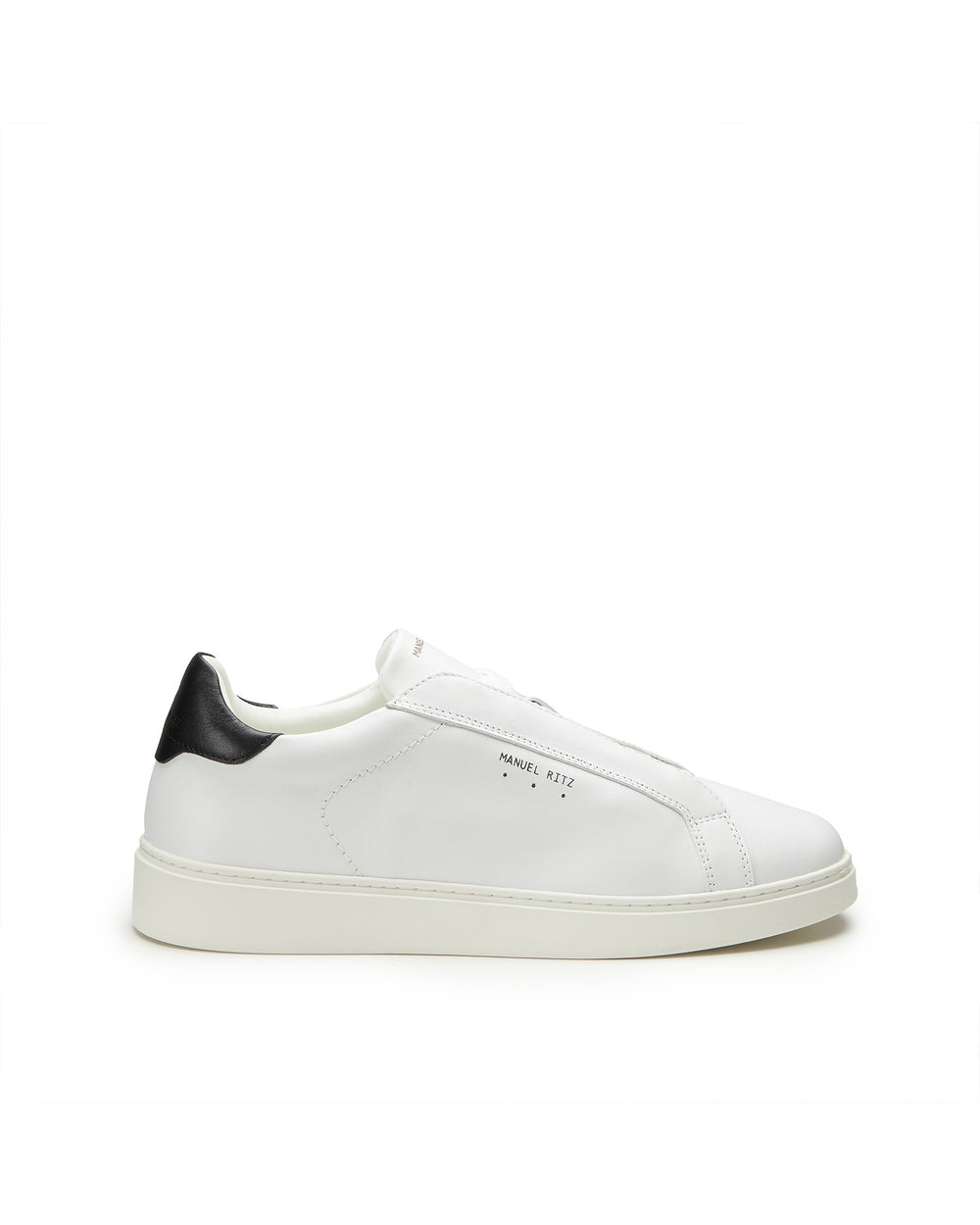 Sneakers in pelle bianca contrasto nero