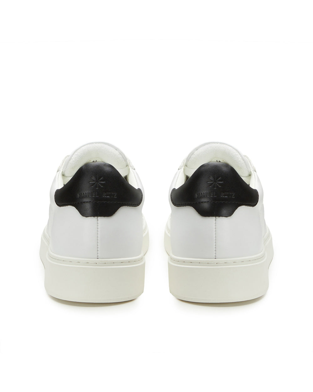 Sneakers  in pelle bianca contrasto nero