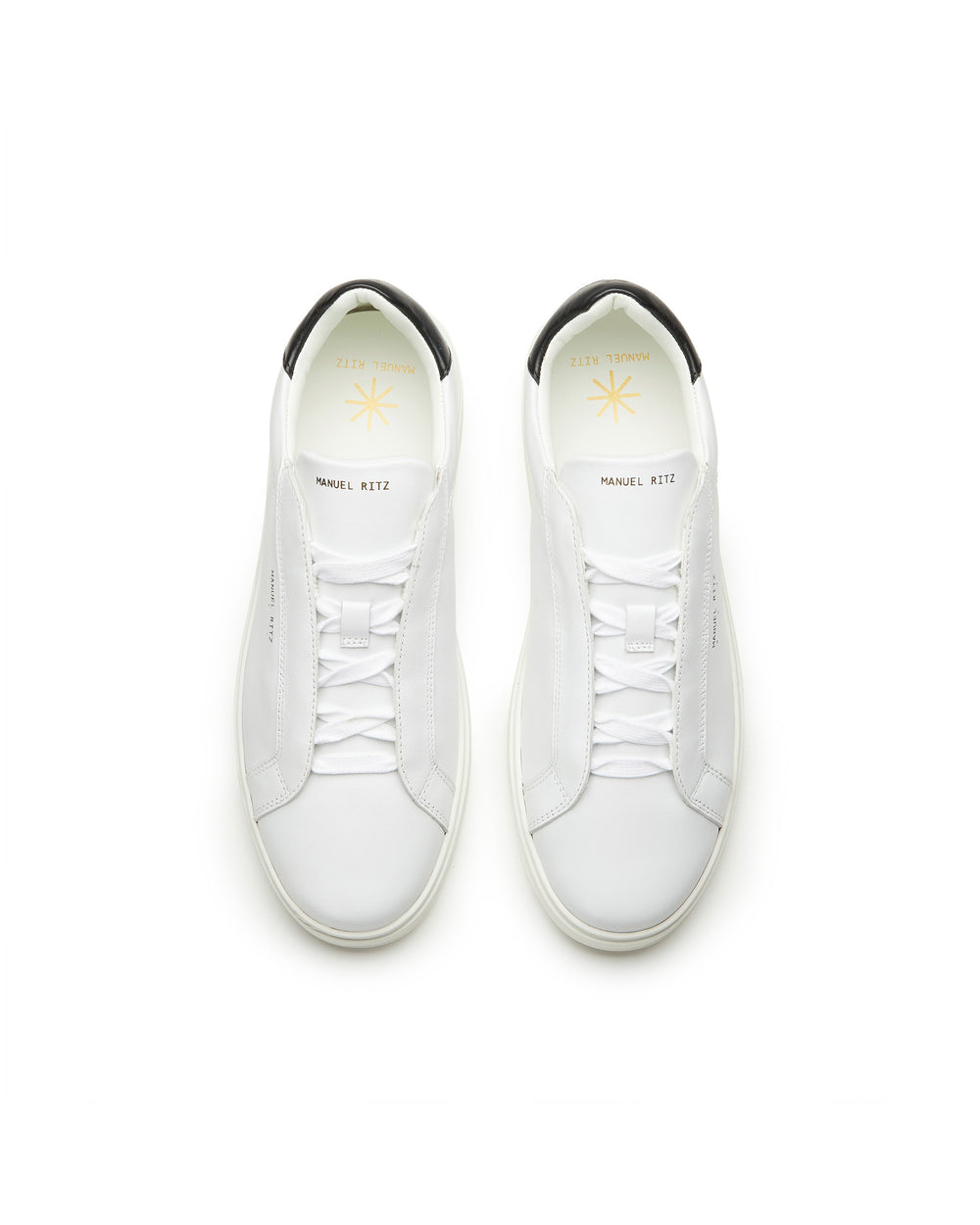 Sneakers  in pelle bianca contrasto nero