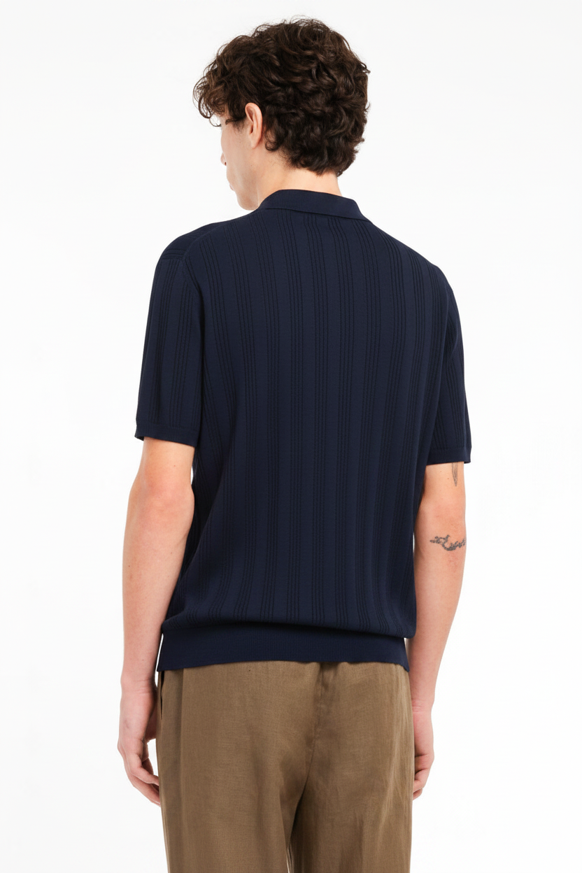 Polo punto riga verticale traforato in cotone blu