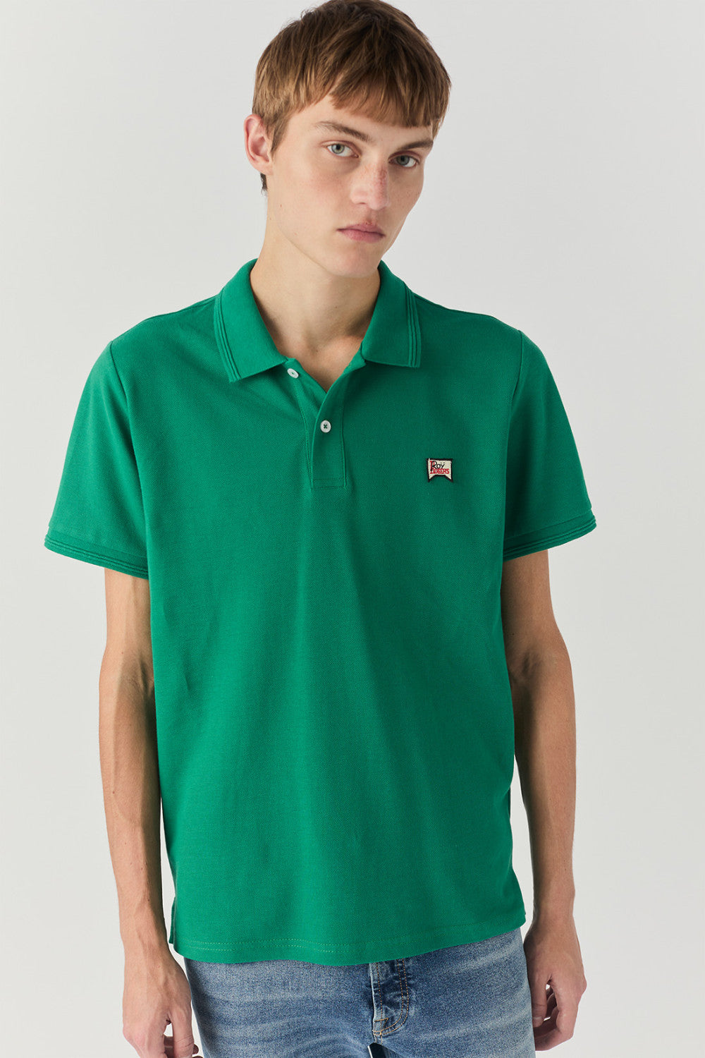 Polo in piquet con logo verde