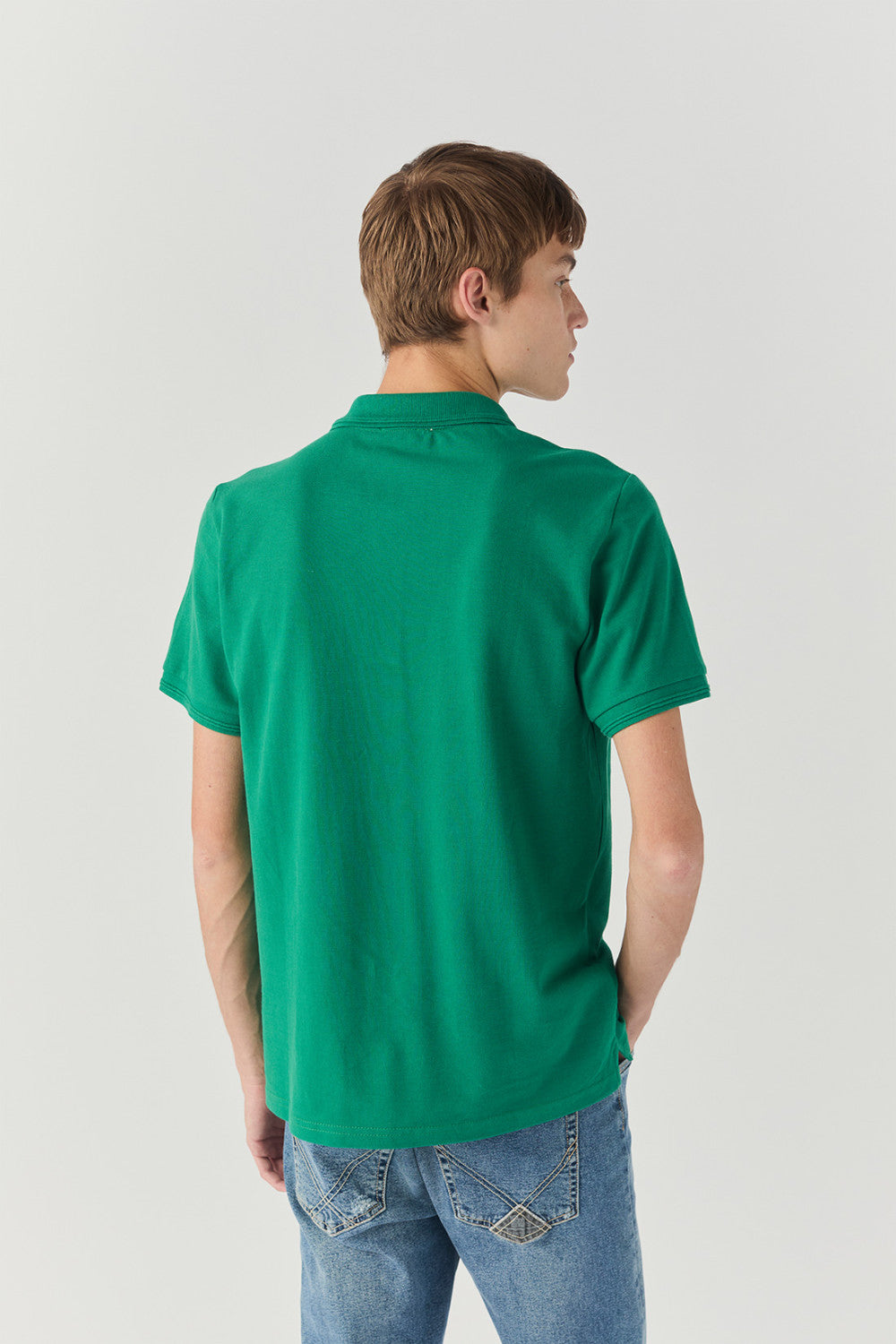 Polo in piquet con logo verde